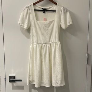 AQUA dress exclusively sold at Bloomingdale’s.